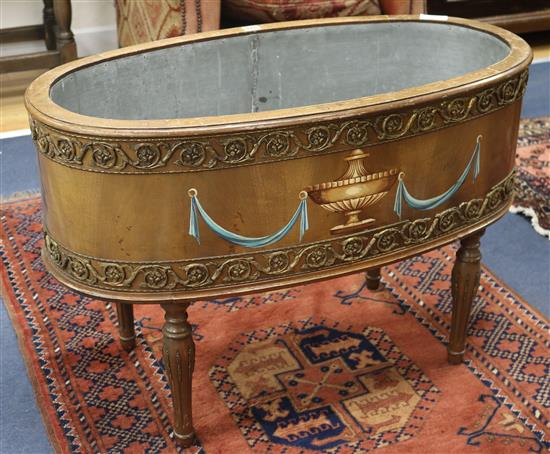 A mahogany oval inlaid planter